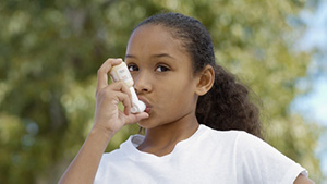 young-girl-asthma-inhaler 300